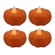 Sada čtyř oranžových LED svíček ve tvaru dýně
