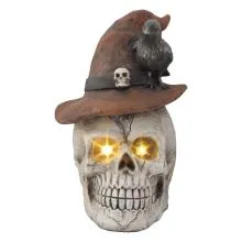 Halloweenská dekorace lebka s čarodějnickým kloboukem a svítícíma očima