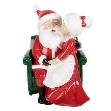 Santa Claus v křesle s paní Clausovou